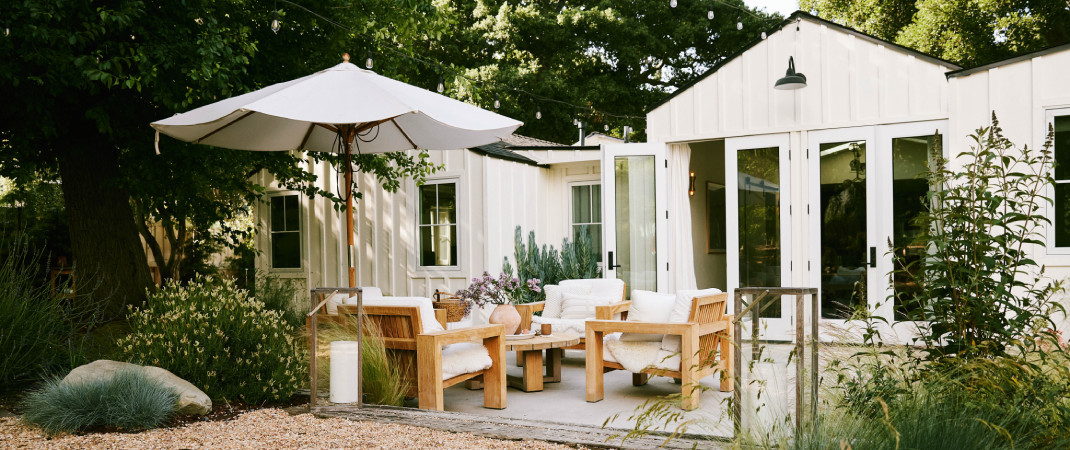 Yardzen backyard with an outdoor patio and furniture