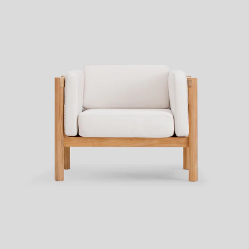 Wooden frame chair with white cushions
