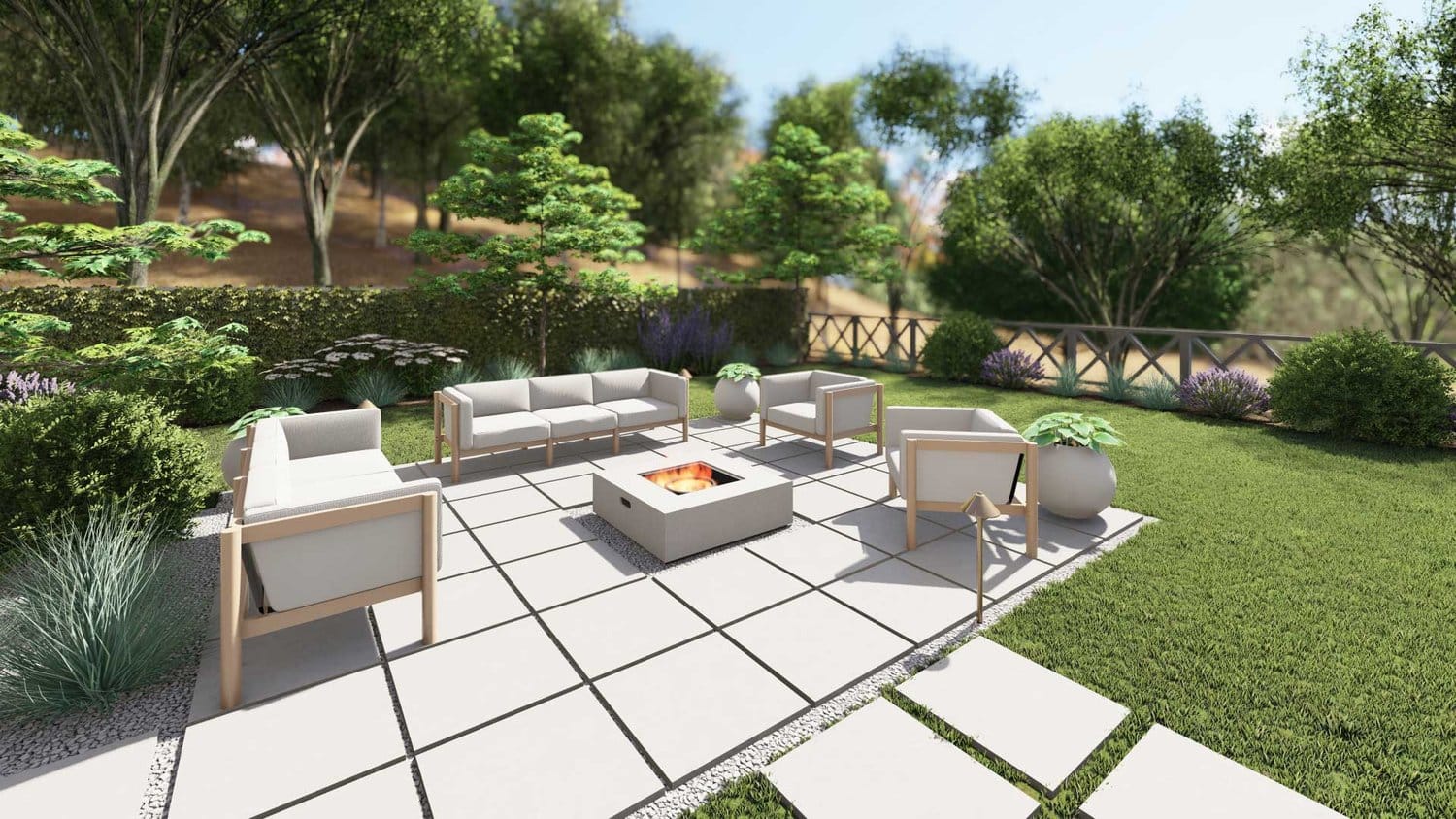 New Canaan patio design with paver and a fire pit with beautiful plants surrounding