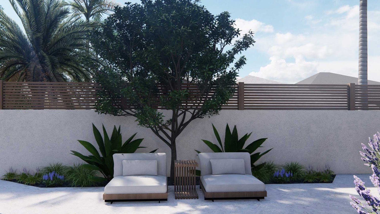 Los Angeles concrete paved side yard with plants, tree and chaise lounge set