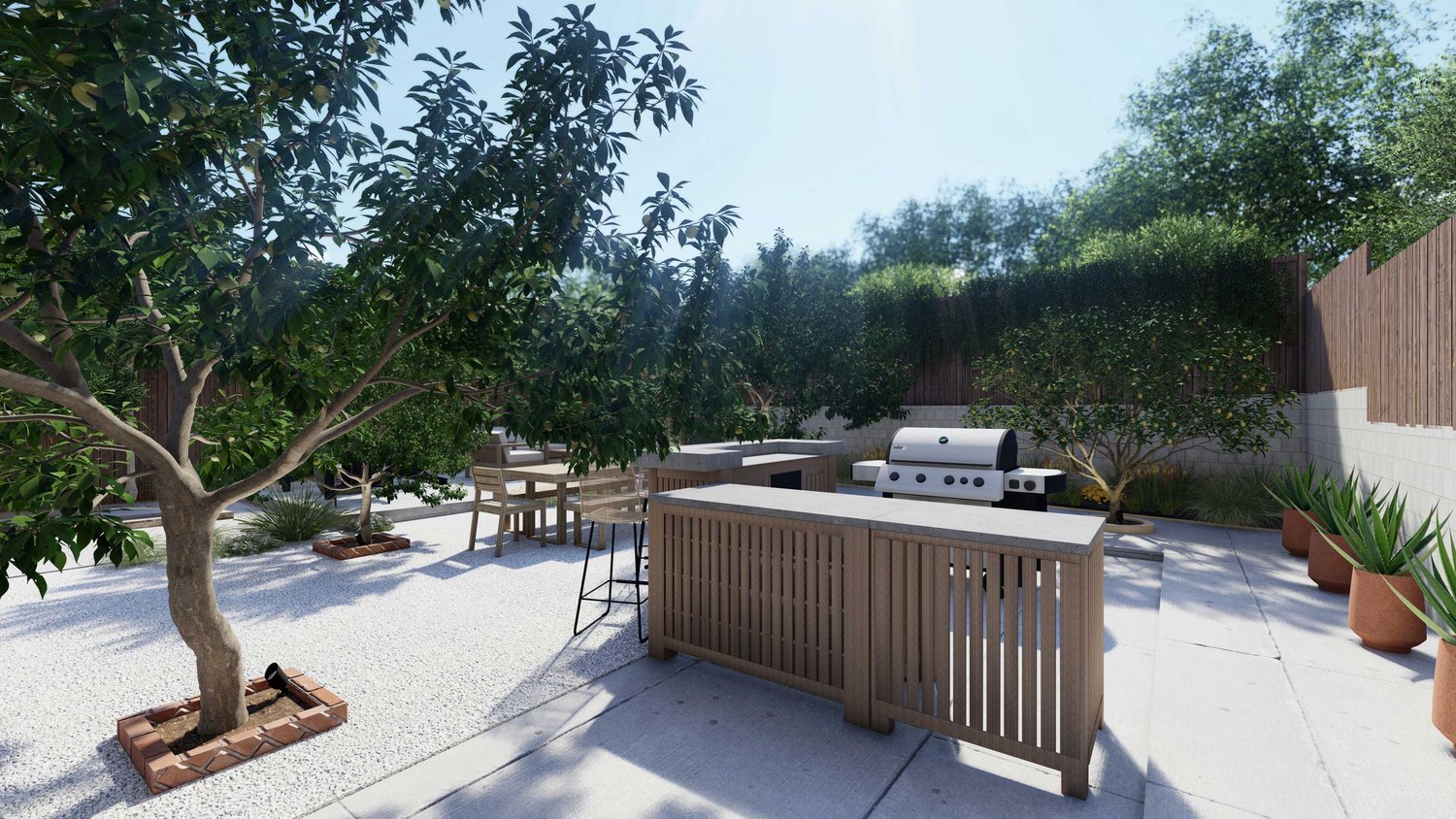 Los Angeles fenced backyard kitchen area with dining set in the background, planters and trees