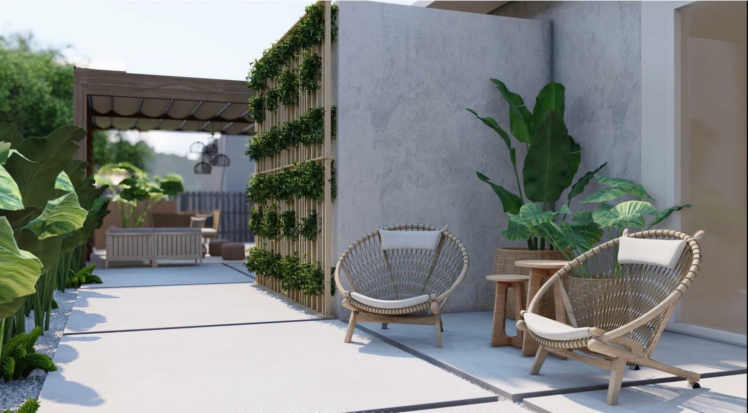 Close up of Miami yard with paver, outdoor chairs and wall plants