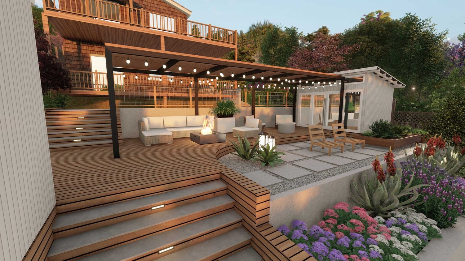 Mill Valley backyard showing deck patio with fire pit seating area, paved seating area and flowers