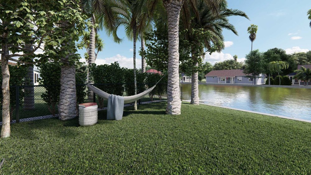 Palm Beach backyard with trees and a tree hammock