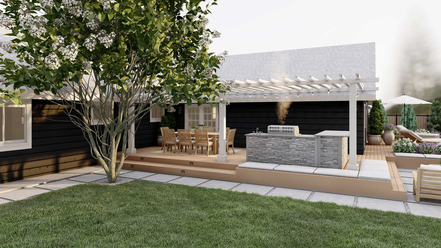 Twin Falls backyard showing deck patio with pergola over outdoor kitchen and dining area