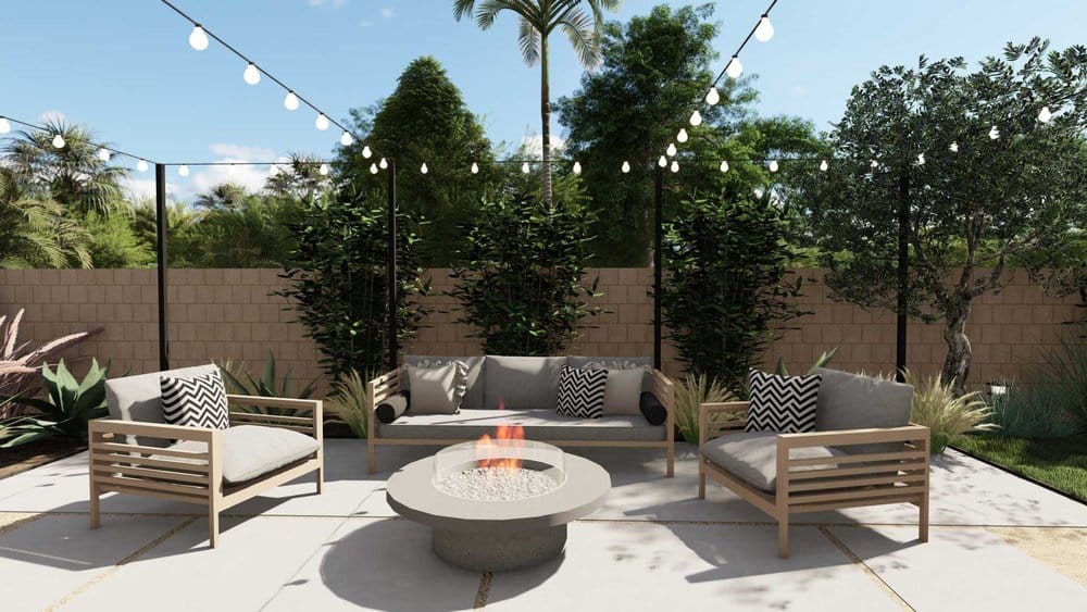 outdoor fire pit seating area with modern fire pit and overhead string lights
