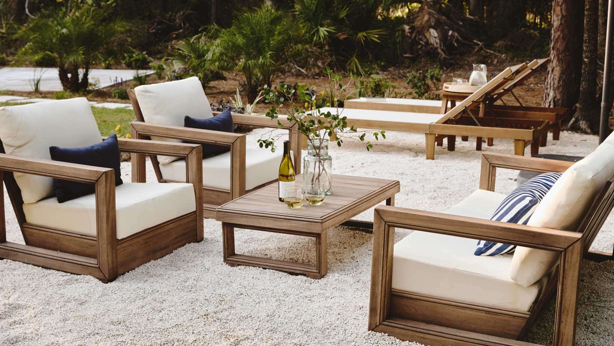 Close up of outdoor seating area with lounge chairs and coffee table