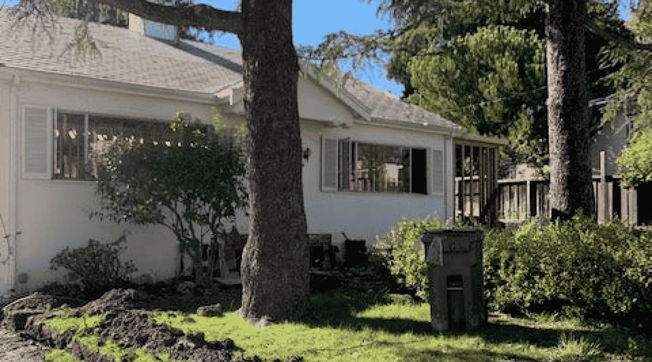 Before photo of under-construction front yard and home