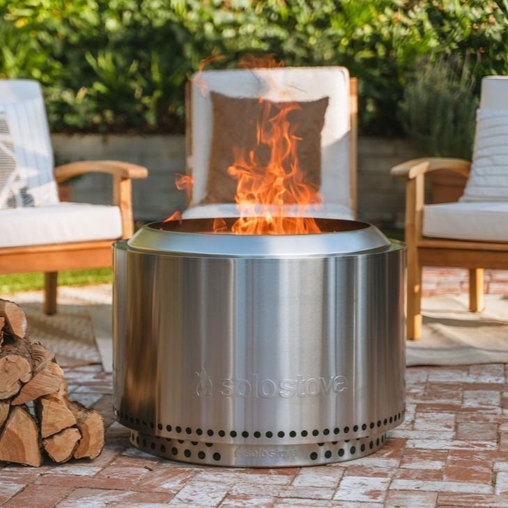Solo Stove's Yukon Ultimate Bundle - Hassle free and smokeless, create the ultimate backyard fire pit experience with this stainless steel firepit and accessories bundle. Featuring Solo Stove’s Signature 360° Airflow Design™, this 27” wood burning fire pit will give you a smoke free, roaring fire in minutes.SHOP NOW >” loading=”lazy”></noscript><br/><img decoding=