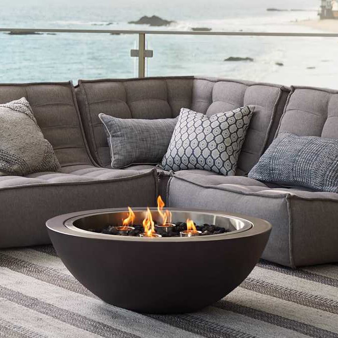 Arhaus Round Concrete Fire Pit - Simple yet stylish, this thick concrete bowl fire pit functions with either firewood or disposable gel fuel canisters. SHOP NOW >” loading=”lazy”></noscript><br/><img loading=
