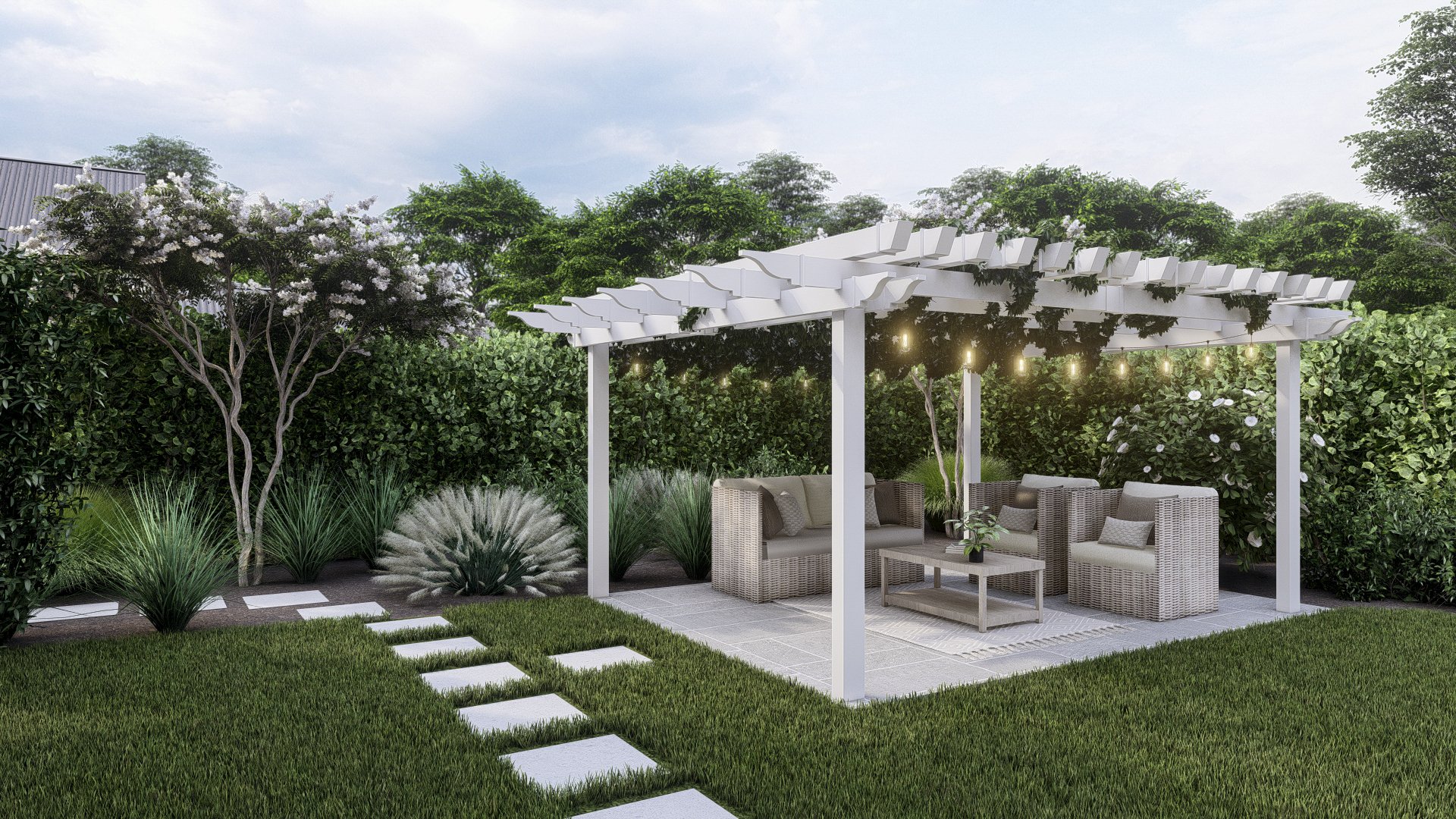 traditional white freestanding pergola on a patio in the corner of a yard shading a seating area