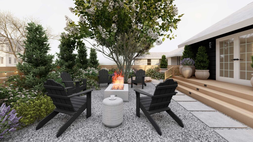 Side view of backyard with gravel fire pit seating area surrounded by drought tolerant plants
