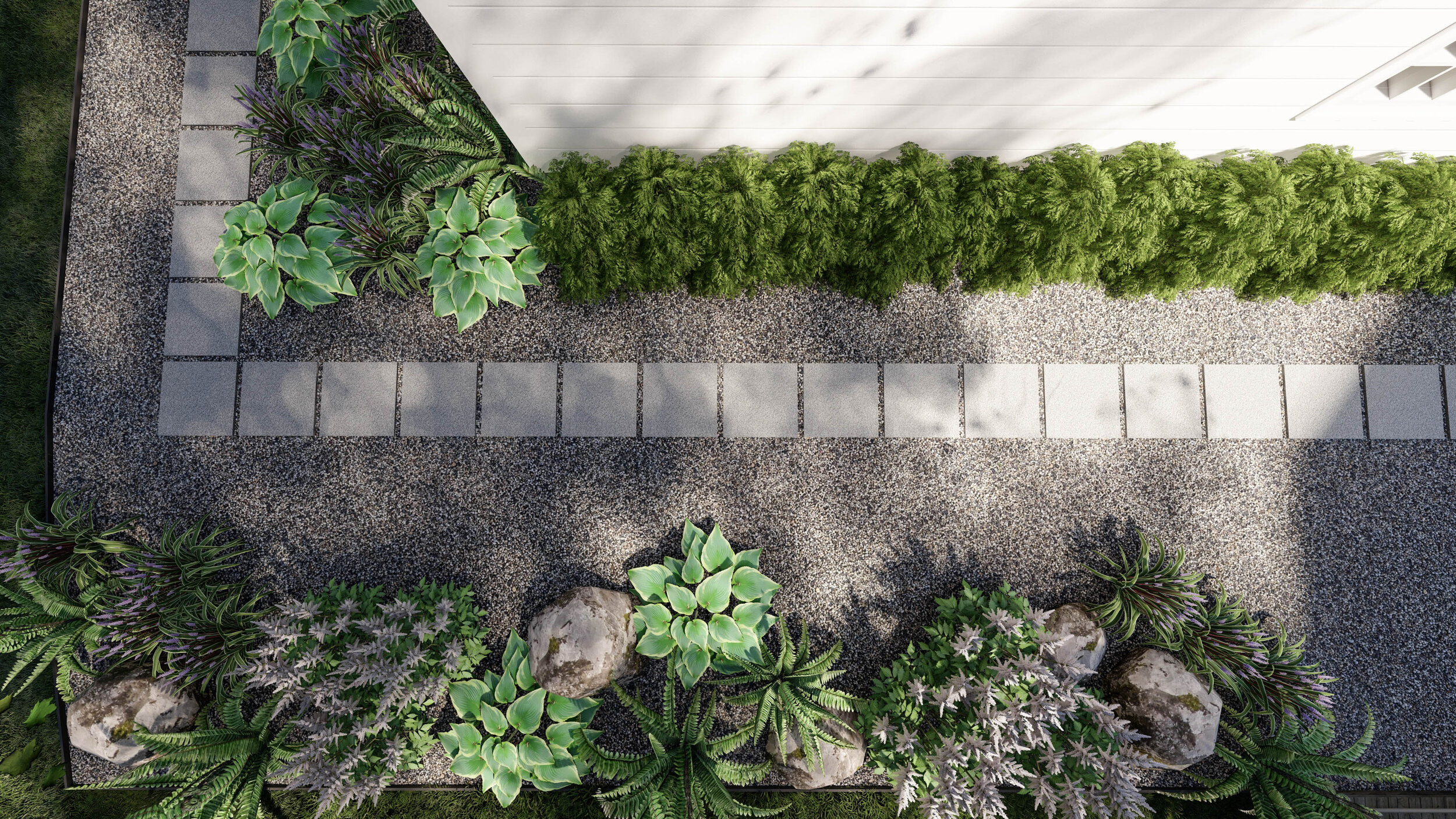Overhead view of paver pathway with gravel and lush plantings