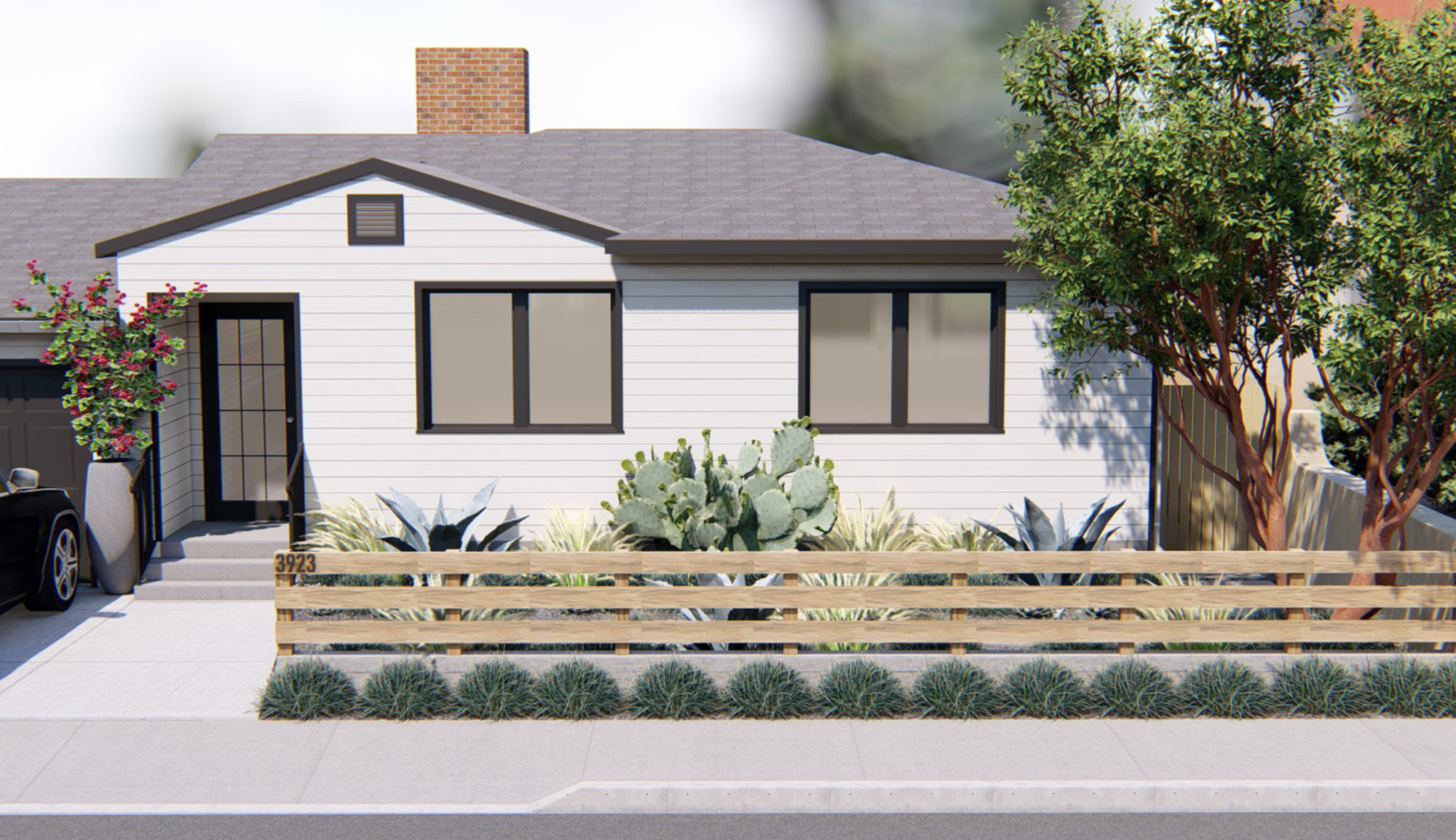 The front yard of the home features the same poured-in-place concrete pavers and beach pebbles that are used in the backyard, and the plantings also coordinate. The fence will be extended with a gate across the driveway.