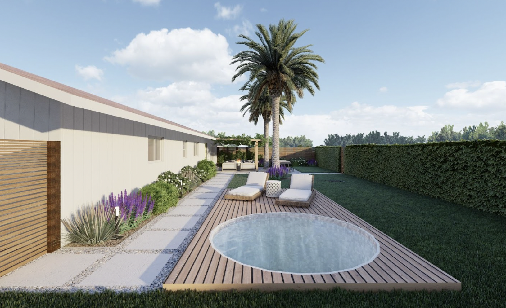 Backyard design with an in-deck stock tank pool with adjacent lounge chairs and palm trees in the background.