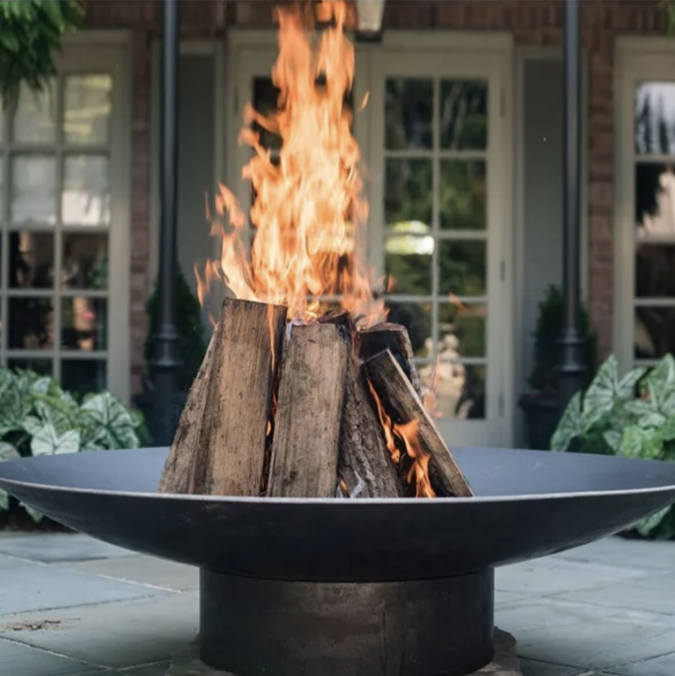 Hartlepool Concave Steel Wood-Burning Fire Pit - For rustic settings, from modern farmhouses and cottages with overgrown vines, the patinated finish of this swooping dish and solid base is the perfect way to stay cozy after sunset.SHOP NOW >” loading=”lazy”></noscript><br/><img loading=
