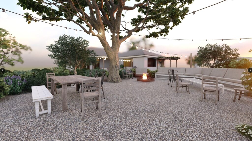 Large gravel backyard with multiple seating areas installed around existing tree