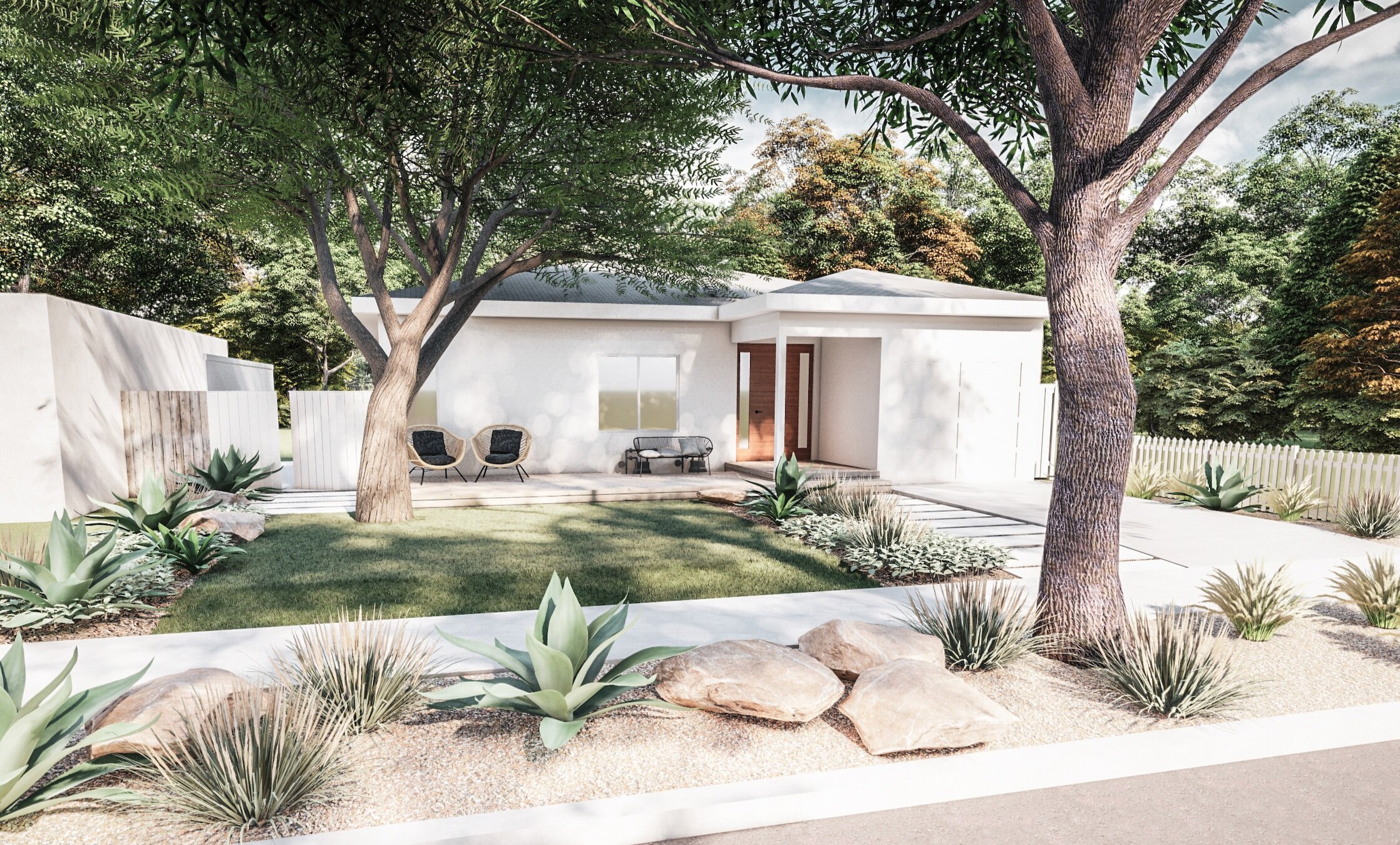 Front yard with concrete walkway, outdoor furniture, trees and ornamental plants.