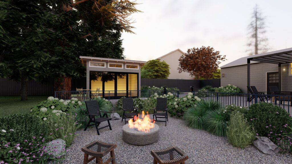 Graveled paved fire area ringed in dense planting, furnished with easy-to-move seats next to an ADU