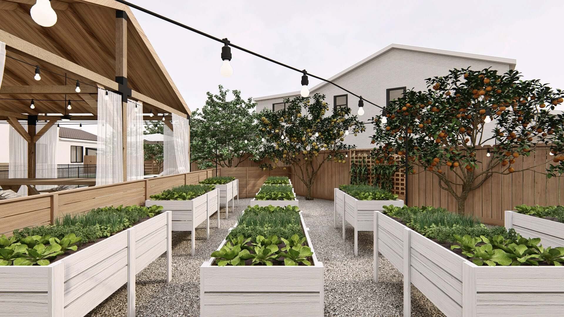 Rows of raised beds filled with herbs and vegetables in Yardzen backyard landscape design