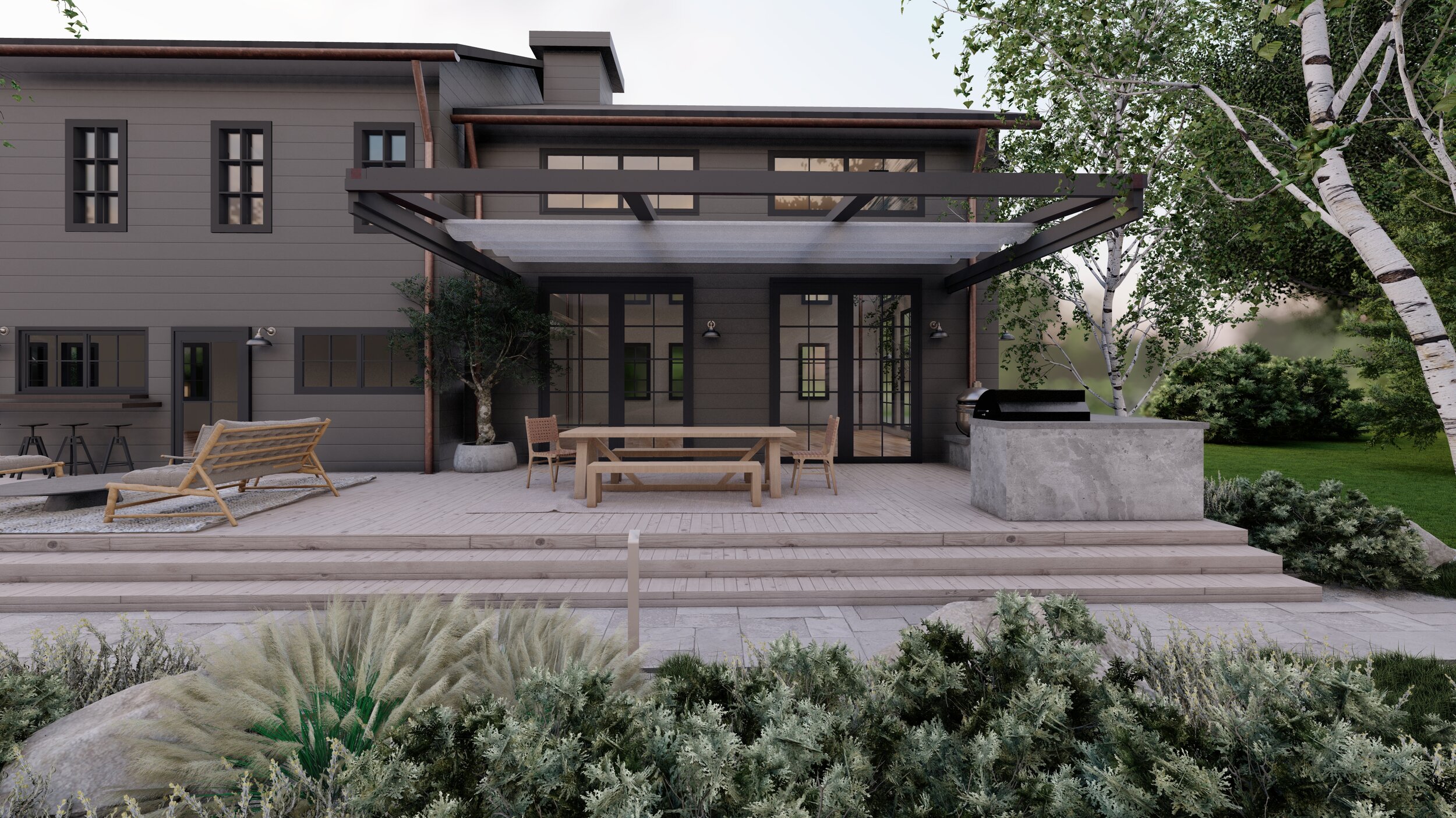 Dark charcoal home exterior with grasses, birch trees near outdoor dining area and outdoor kitchen under pergola
