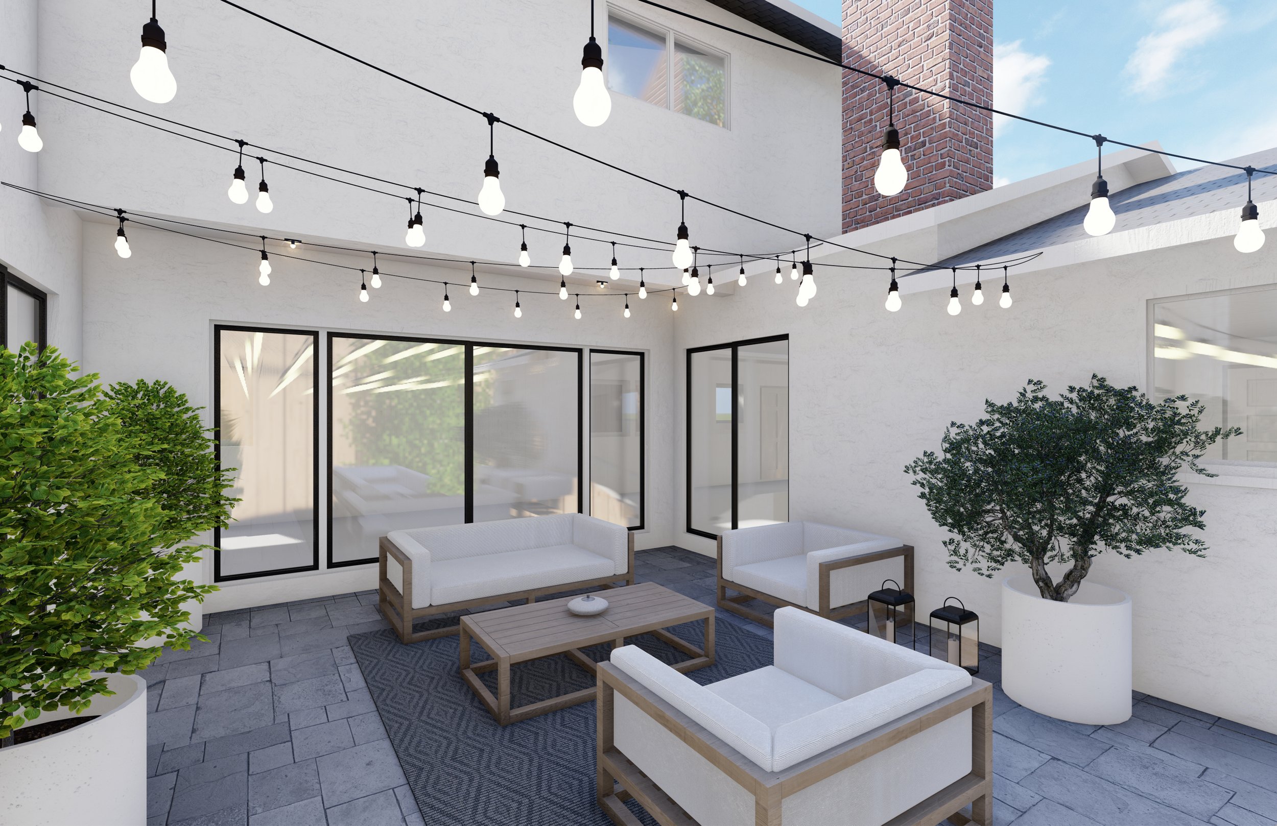 Courtyard design with concrete paver patio and teak outdoor sofa, lounge chairs, and coffee table with overhead string lights.