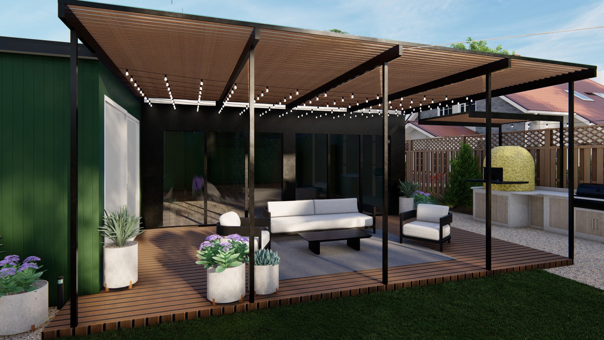 Bright wood backyard deck and matching pergola with black posts and black aluminum outdoor furniture.