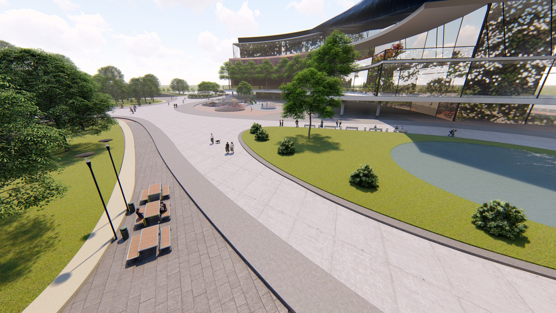  The main promenade with picnic tables and pond in the background. 