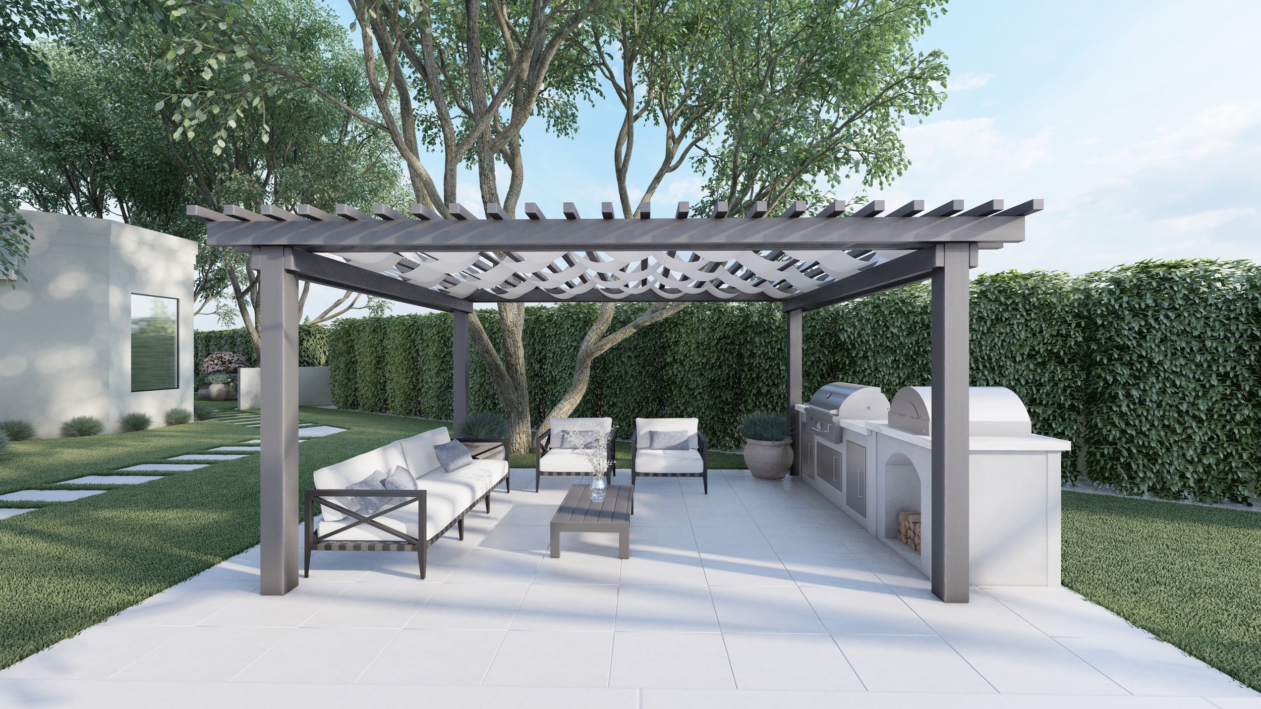 An outdoor kitchen with a pergola over it and greenery all around