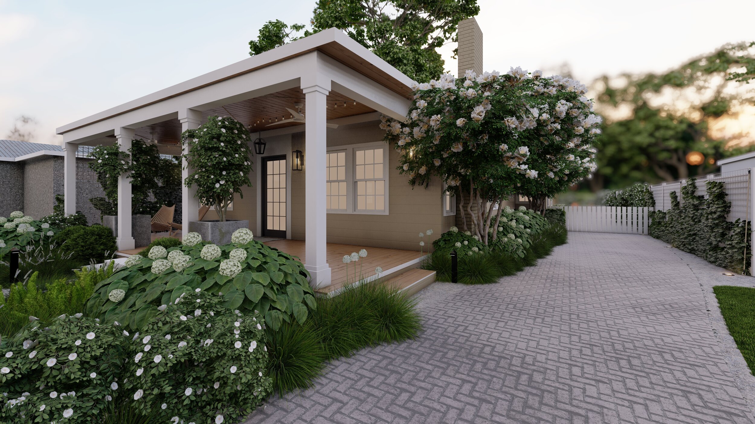 A small house with a porch and a covered patio surrounded by white flowering plants