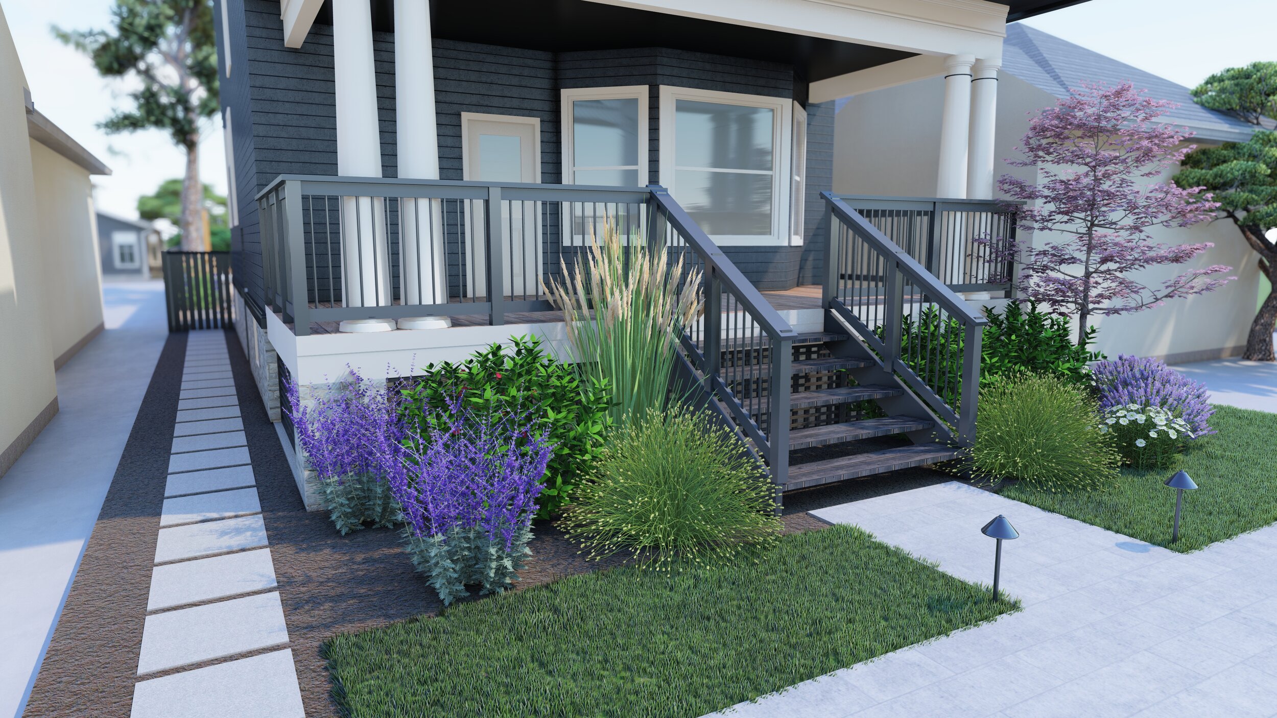 Front yard view of blue home exterior with white trim and lush plantings around porch and paver pathway to side yard