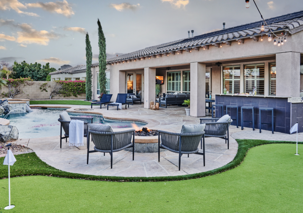 A Yardzen client’s country club-like backyard with fire pit area