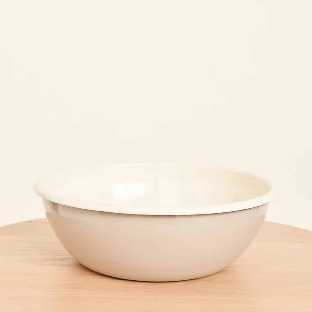 A beige serving bowl