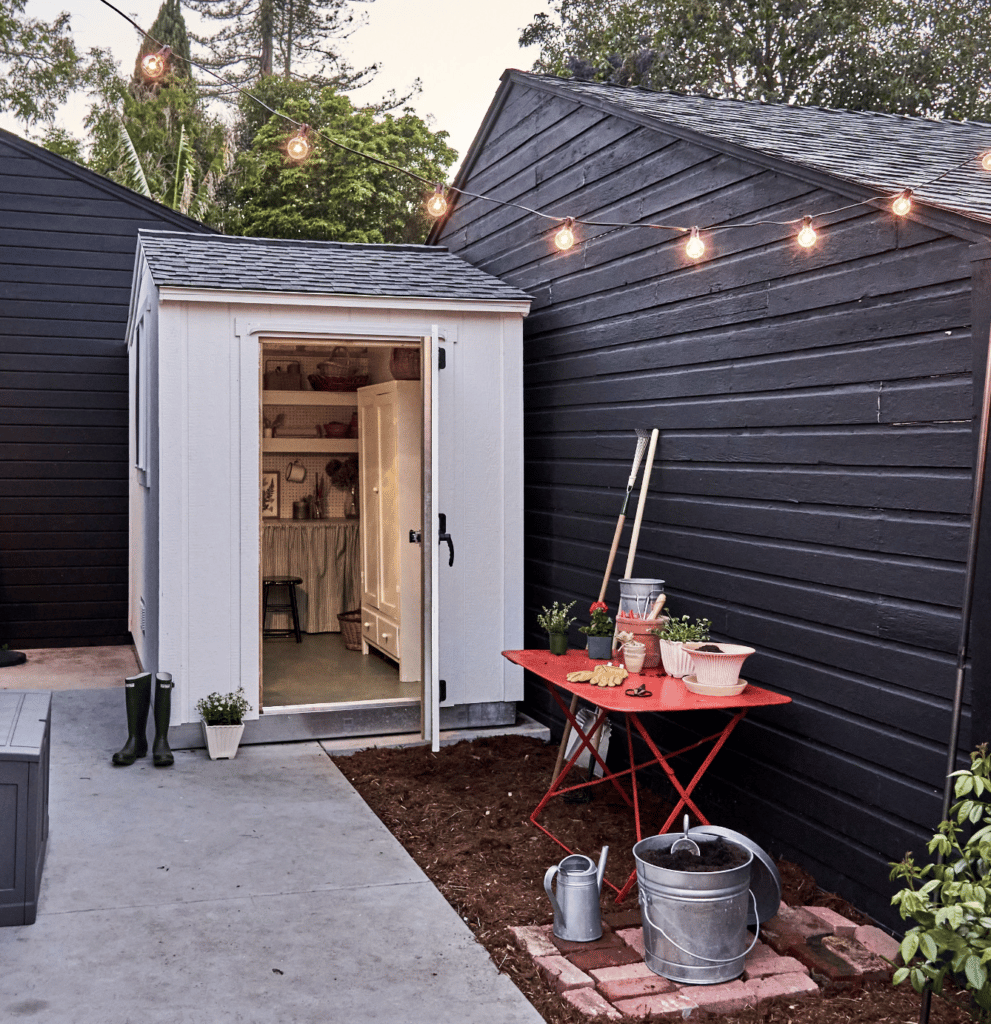 Tuff Shed repurposed as potting and craft shed in backyard