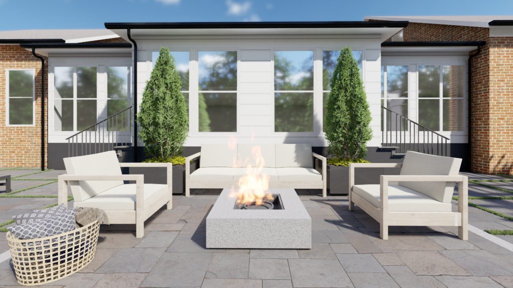 square grey fire pit on paver backyard patio surrounded by evergreens in containers and light-colored patio lounge furniture