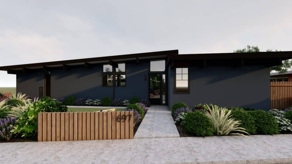 Modern black home with ornamental grasses and shrubs in front yard landscaping and ornamental "wall" made with 4x4 posts vertically set in ground