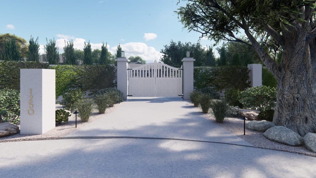 Ivy-covered privacy wall and tall white gate securing the driveway entrance to a home