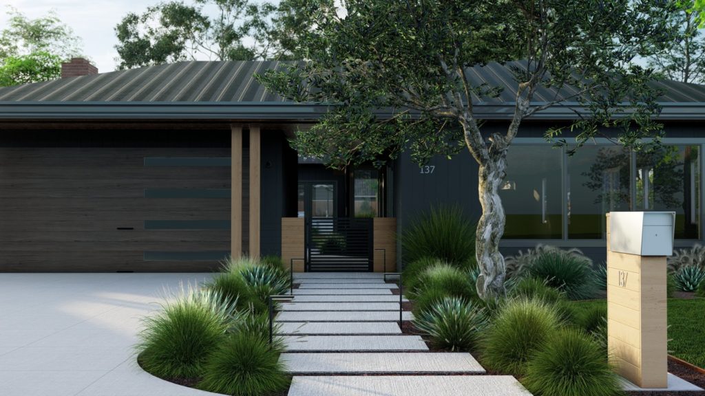 Modern black home with dark wooden garage door and large windows and large concrete paver front path with verdant ornamental grasses flanking path