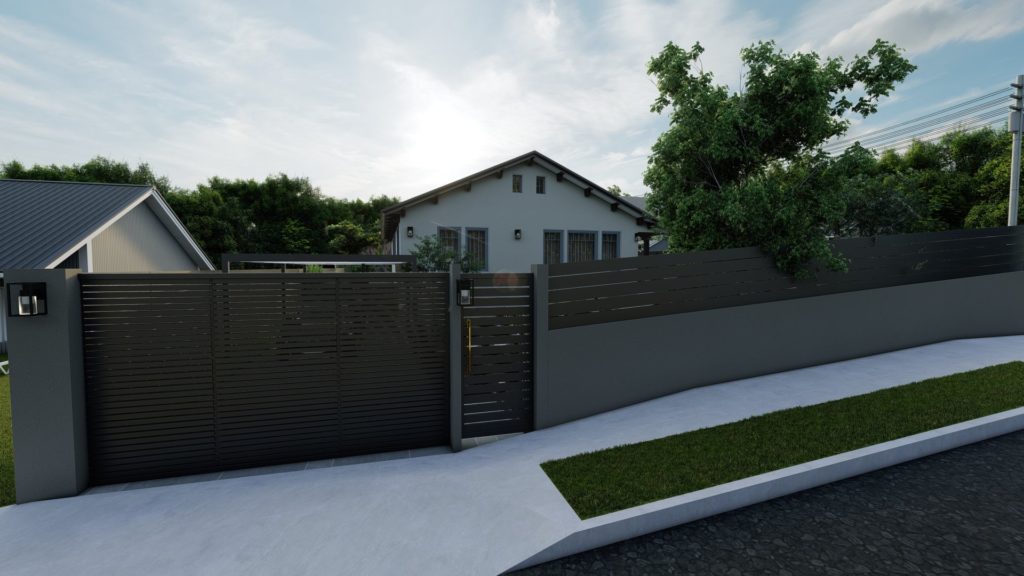 Privacy wall and fence at front of home with black metal driveway gate and gate to front walk.