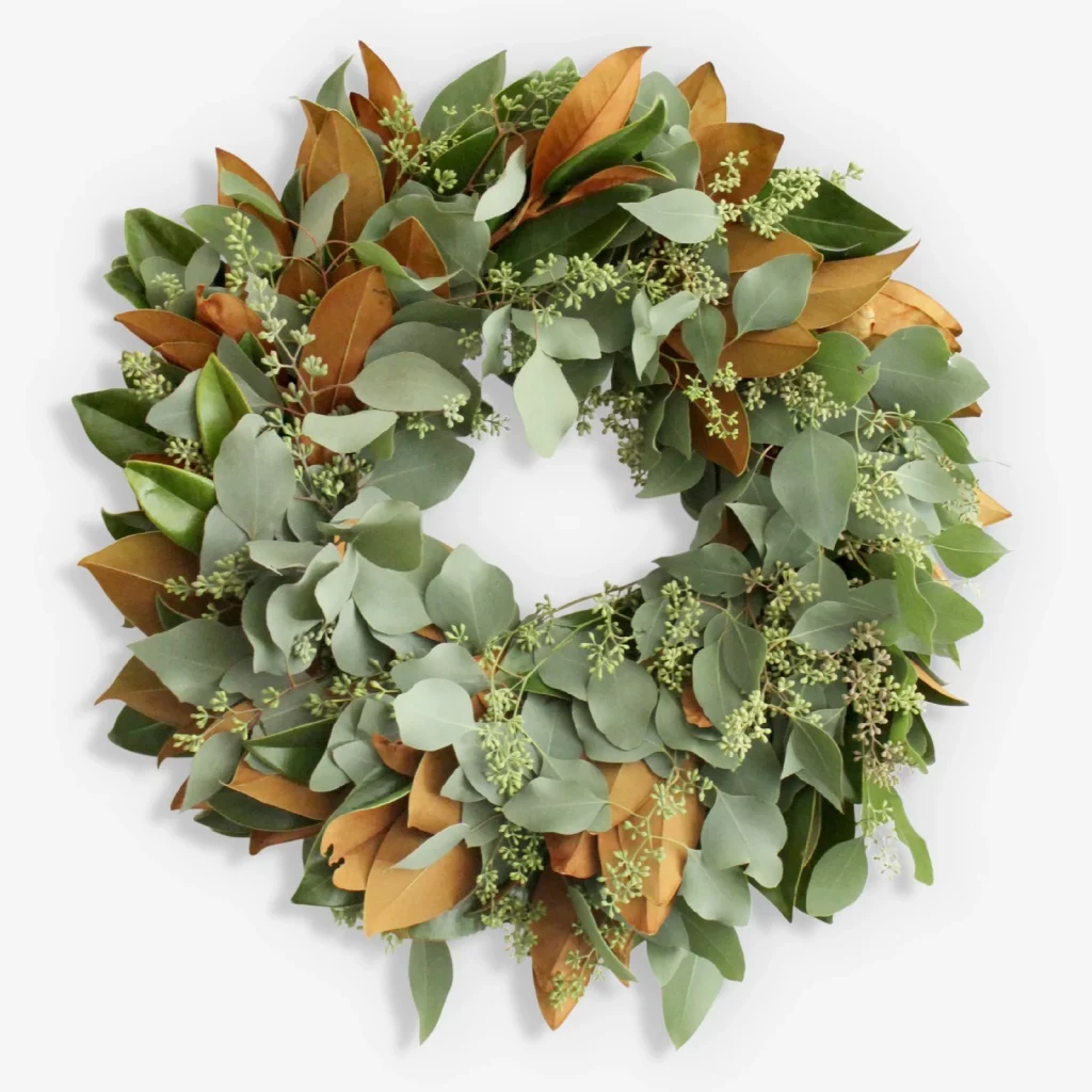 Fresh wreath made of magnolia and eucalyptus leaves 