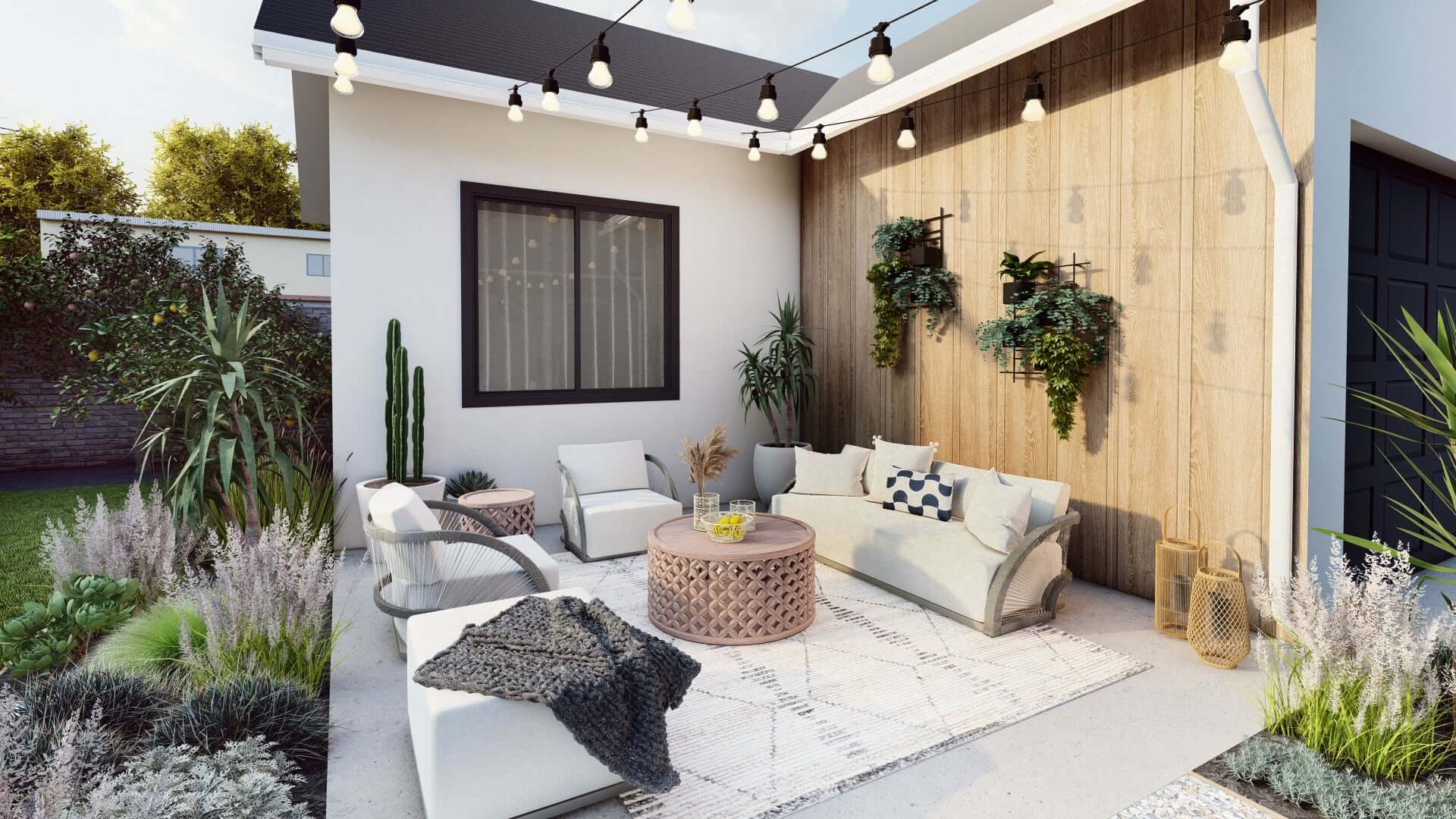 a backyard seating area with a couch, lounge chairs, and wall planters against a wooden accent wall