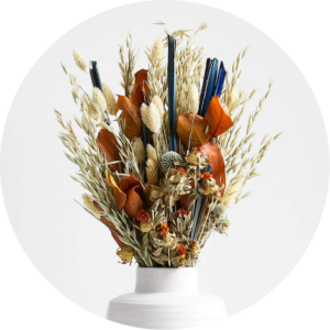 Dried flowers in a white vase