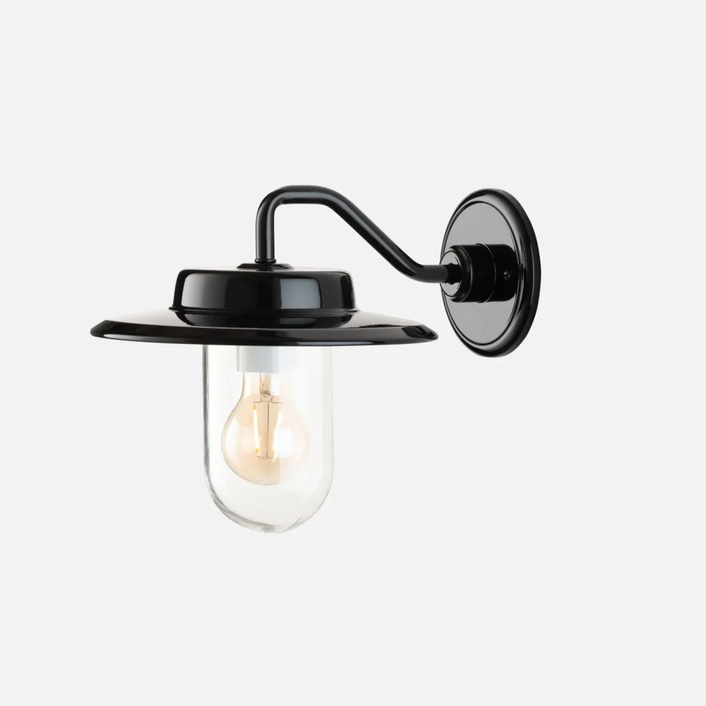 Black metal outdoor lamp with glass covering
