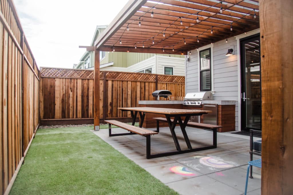 Small backyard with outdoor dining area