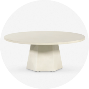 White circular coffee table with geometric base.