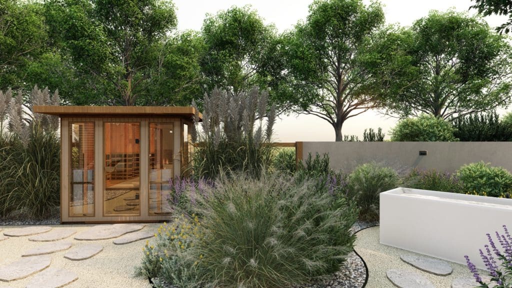 Large outdoor sauna with full length windows and glass door flanked by tall grasses in a yard with flagstone paths and adjacent water feature.