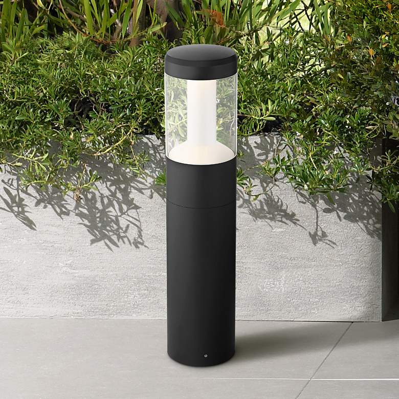 Tall cylindrical outdoor landscaping light