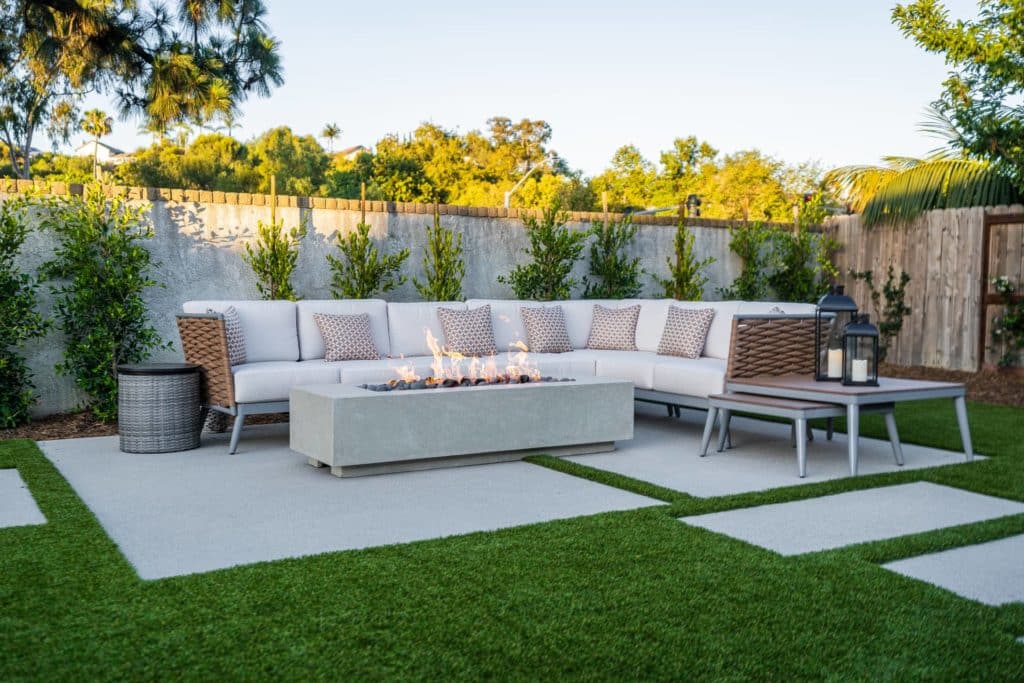 Backyard with modern fire pit and seating area