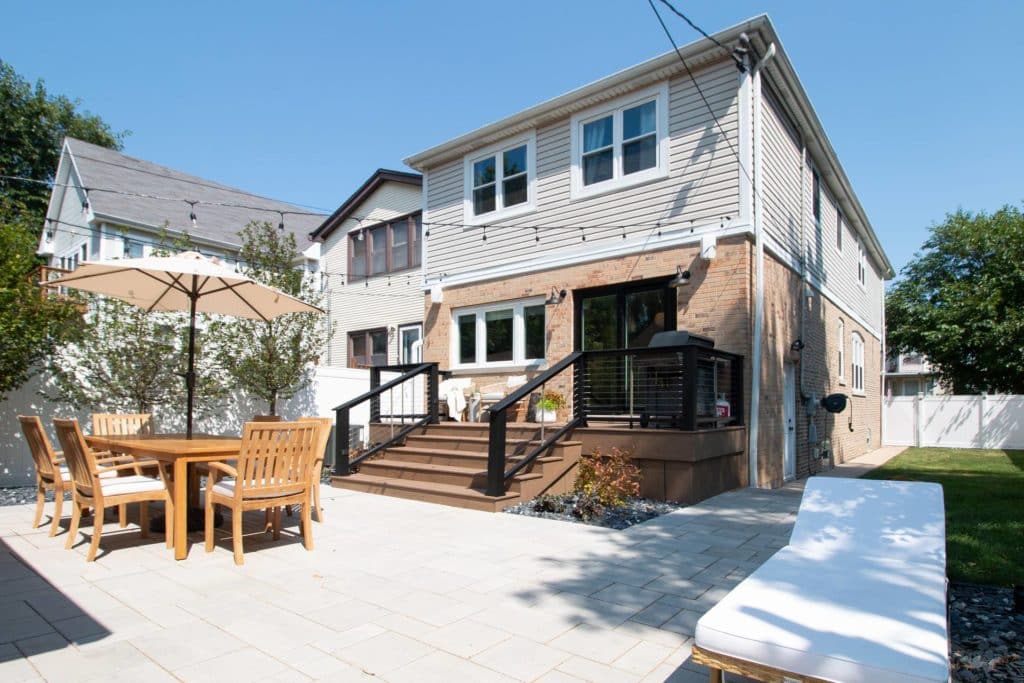 Backyard with new deck and outdoor dining area