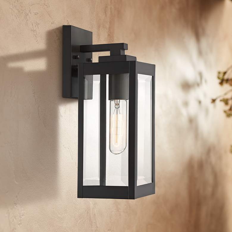 Rectangle shaped wall light made of black metal and glass